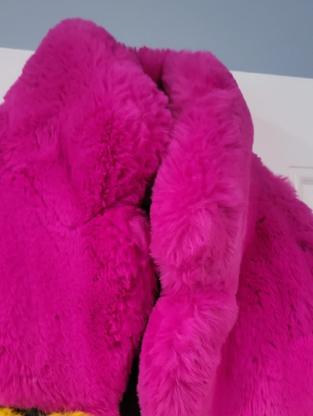 Womenso Bright Pink Faux Fur Coat with Yellow & Red Trim